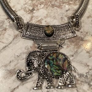 Intricate Silvertone Elephant Necklace with faux Abalone Accents